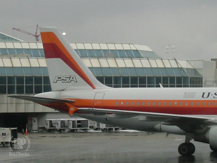Tail of plane with PSA logo